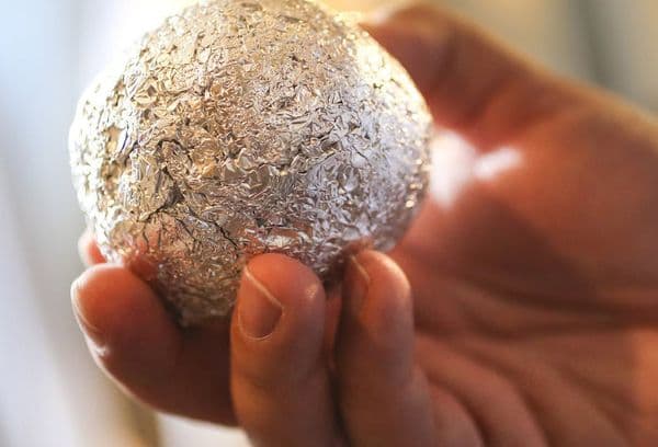 foil ball in hand