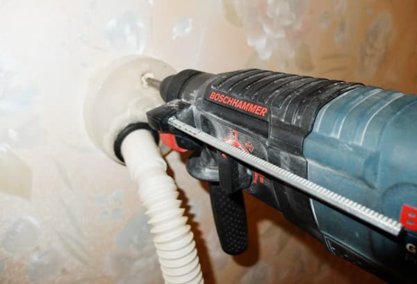 Homemade vacuum cleaner nozzle for working with a puncher