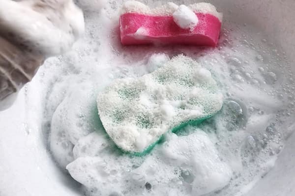 Sponges in soapy foam