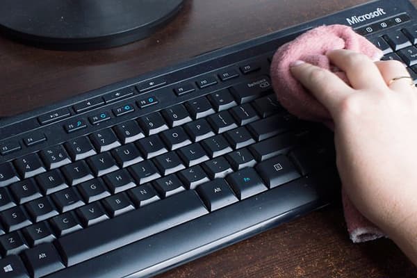 Keyboard wiping with a rag