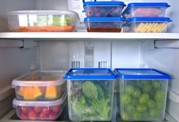 food in containers in the refrigerator