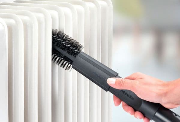 Battery cleaning brush
