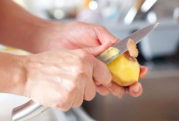 peeling potatoes