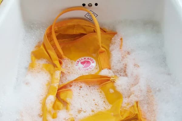 Wash a polyester briefcase