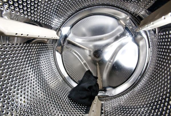 Men's socks in a drum machine