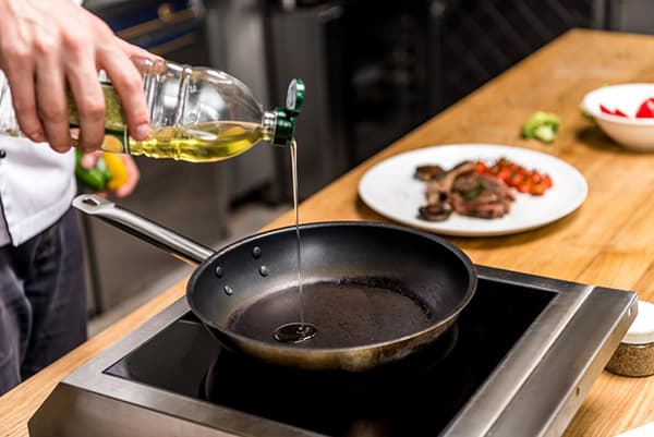 Frying pan with vegetable oil