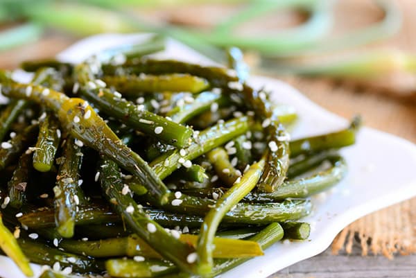Fried garlic arrows with sesame seeds