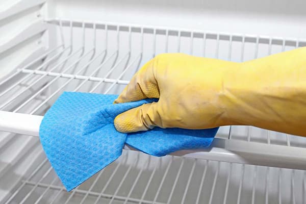 Washing the fridge