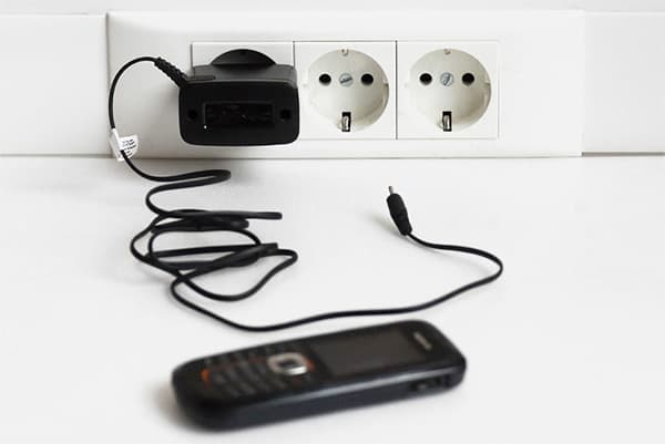 Phone charger left in the wall outlet