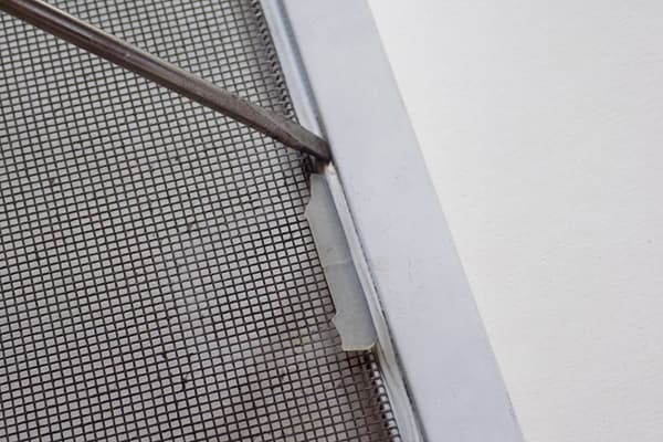 Broken handle on a mosquito net