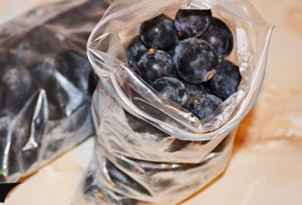 Black grapes in packages