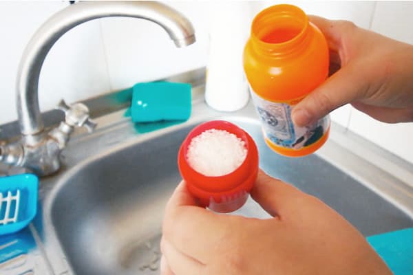 Chemistry for cleaning the sink