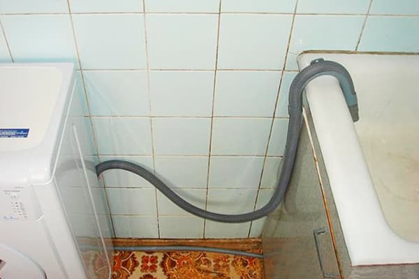 Drain the washing machine into the bathtub