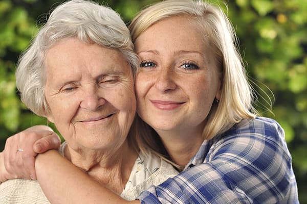 Woman hugs mom