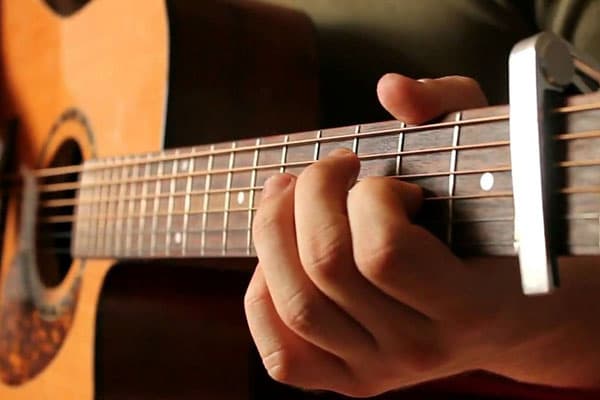Playing guitar