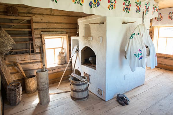 Hut with oven and plank floor