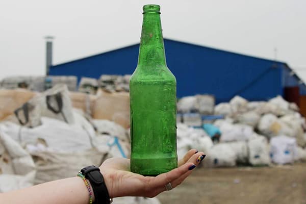 Glass bottle in a landfill