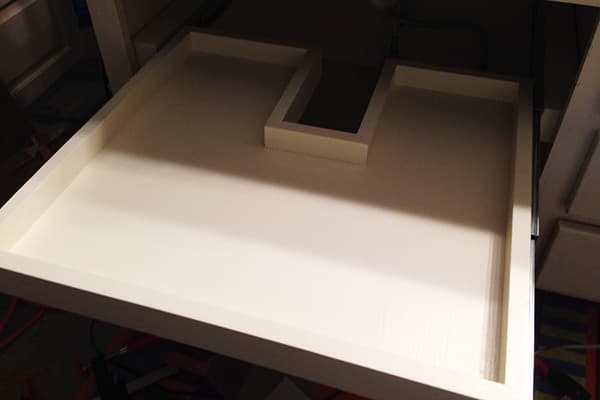 Extendable shelf under the sink