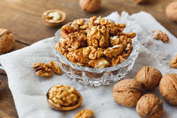 Vase with walnut kernels
