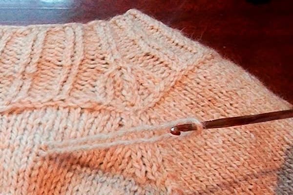 Puff on a knitted sweater